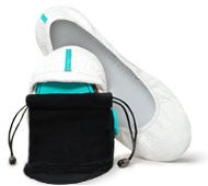 diamond white croc tieks flats folded inside a black pouch